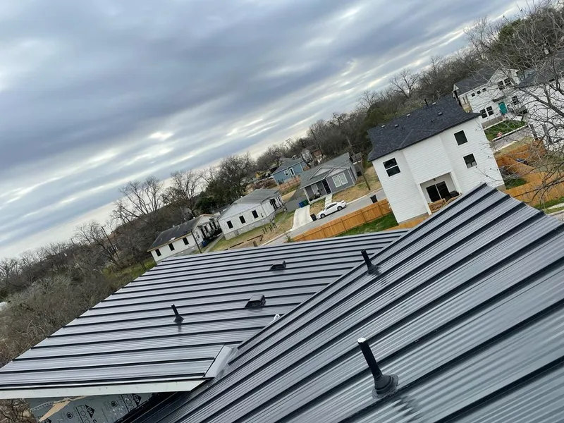 Standing seam metal roof panels with vents for Skylight Repair in Mattoon